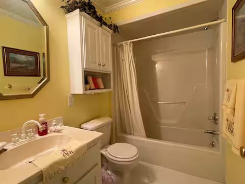 Master ensuite bathroom with tub and separate shower